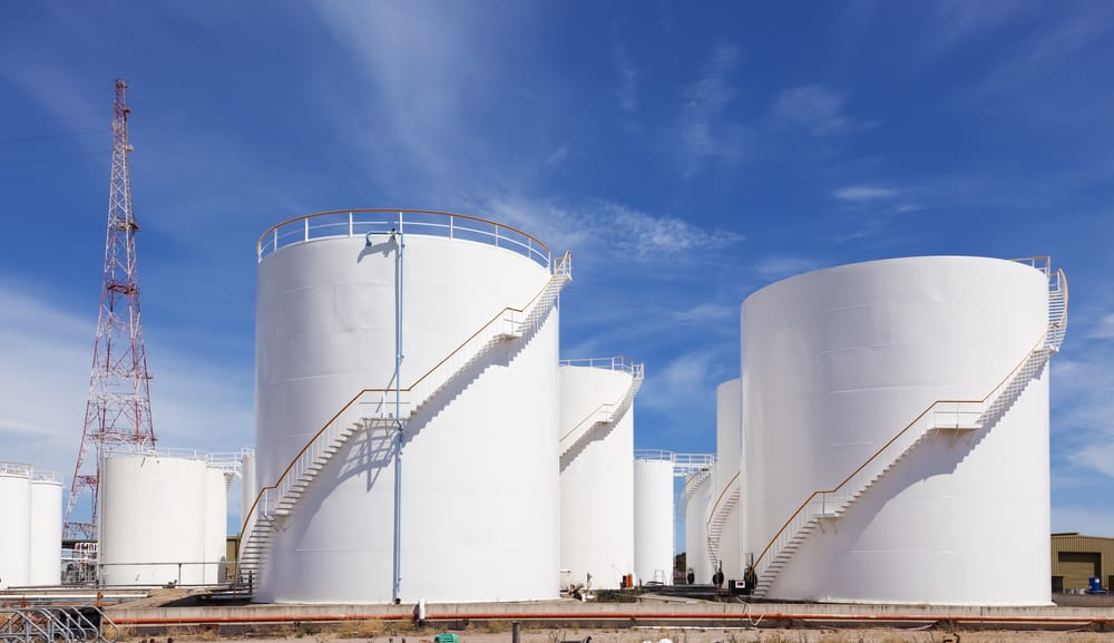 large white fuel storage tanks